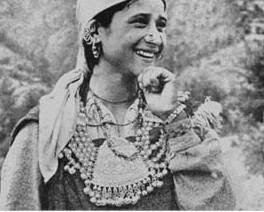 A woman of the Kullu valley in traditional dress