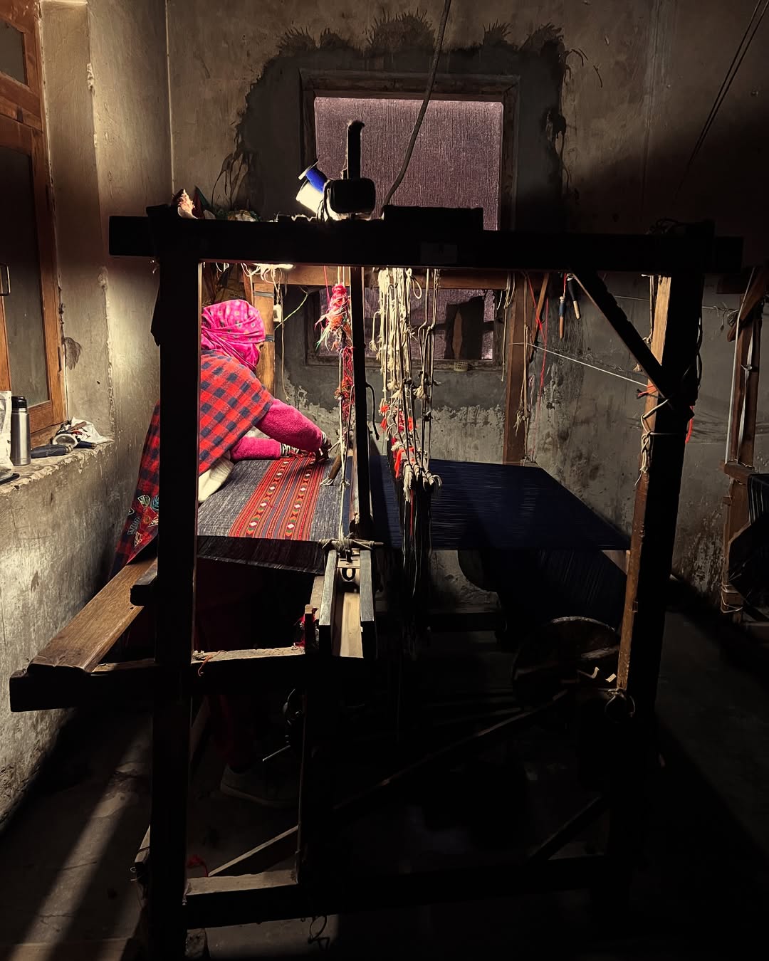 A traditional handloom at work in a Manali home
